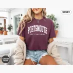 portsmouth-varsity-shirt-nh-hometown-pride-tee-comfort-colors-t-shirt-mature-female-berry.webp portsmouth varsity shirt nh hometown pride tee comfort colors t shirt mature female berry