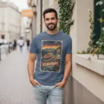 route-66-centennial-flagstaff-shirt-19262026-mother-road-ari-urban-street-male-adult-denim.webp Man wearing denim blue Comfort Colors t-shirt with Route 66 centennial 1926–2026 Mother Road Flagstaff Arizona graphic on front chest